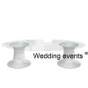 Oval glass event table with 2 white metal base