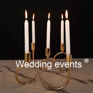 Wavy gold metal candelabra