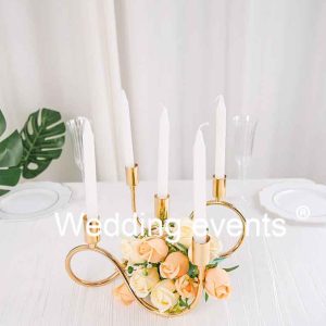 Wavy gold metal candelabra