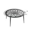 Black round coffee table for hotel living room