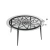 Black round coffee table for hotel living room