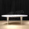 White Oval Dining Table With Three Ball Design Legs